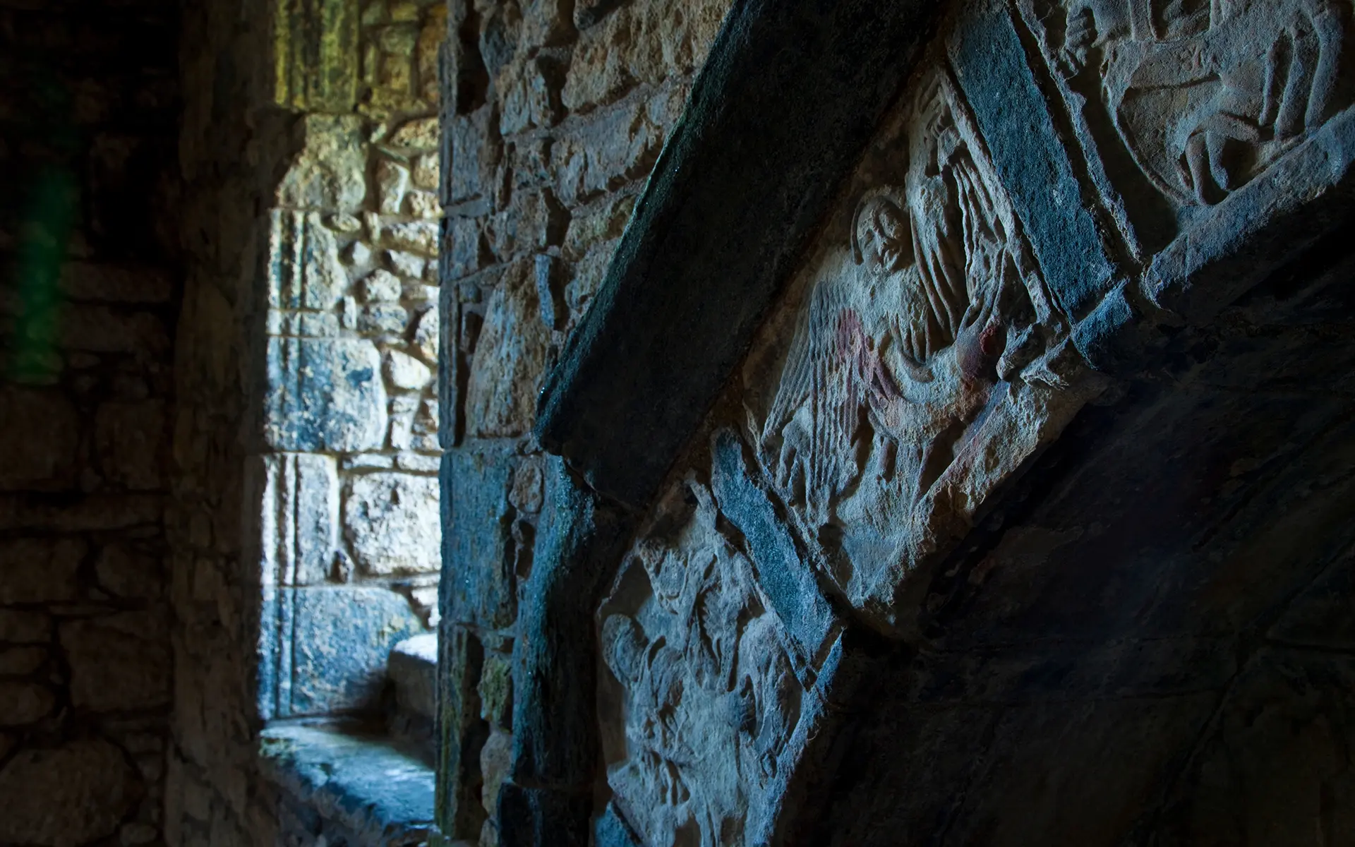 Intricate stone carvings on the tomb of Alasdair Crotach MacLeod